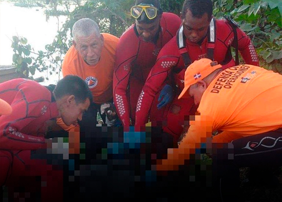 Recuperan cuerpo de motorista que cayó al río Isabela tras accidente en Villa Mella